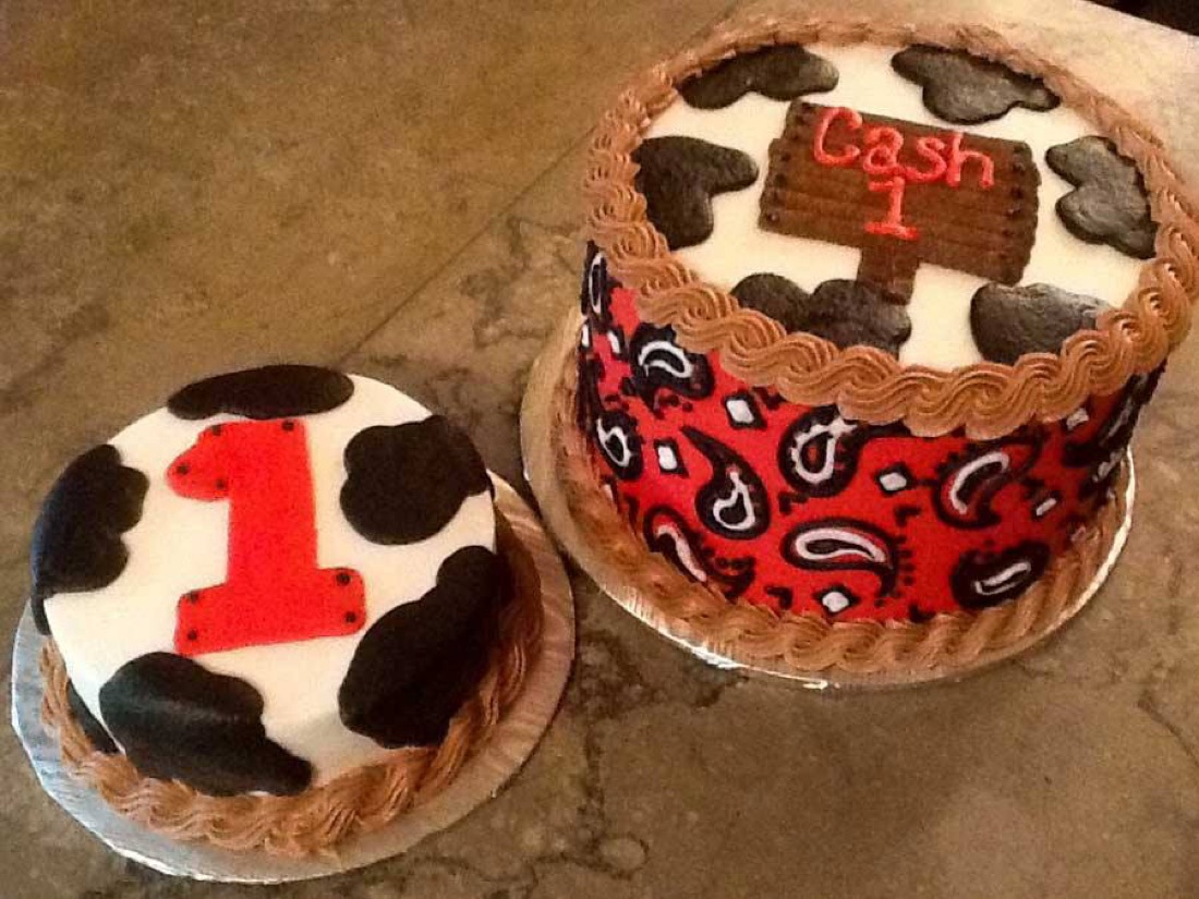 Cow-print first-birthday smash cakes