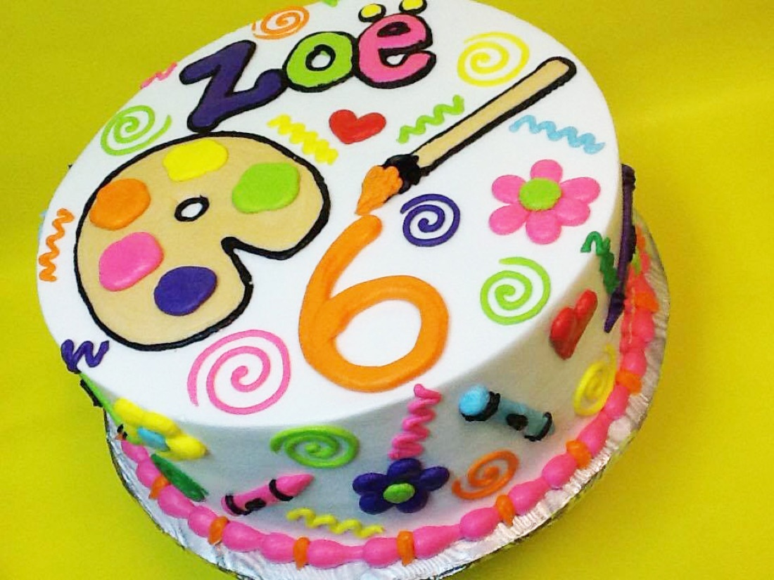 Colorful artist-palette birthday cake