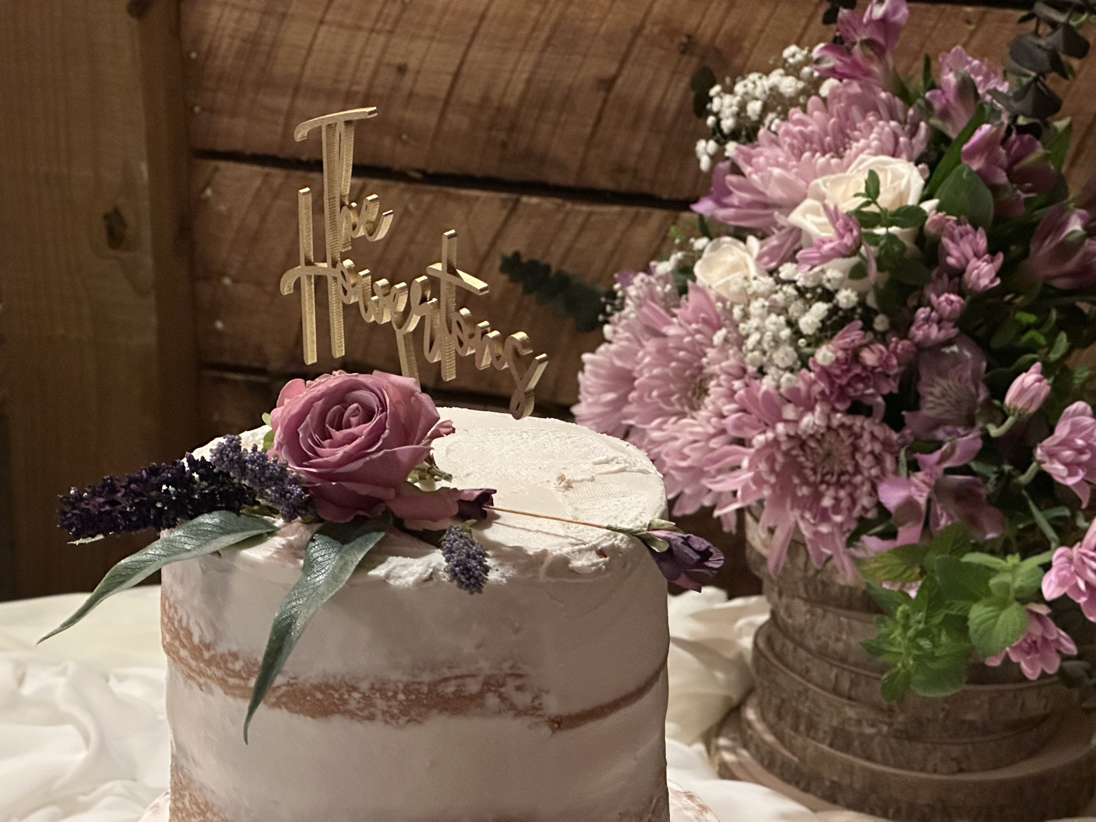 Close detail of fresh lavender and roses on hand-finished buttercream